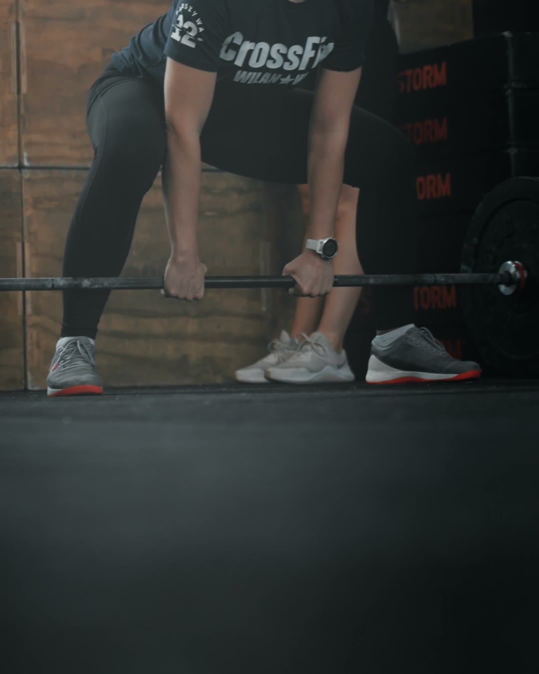 Weronika, a club member, in training: a deadlift with a barbell